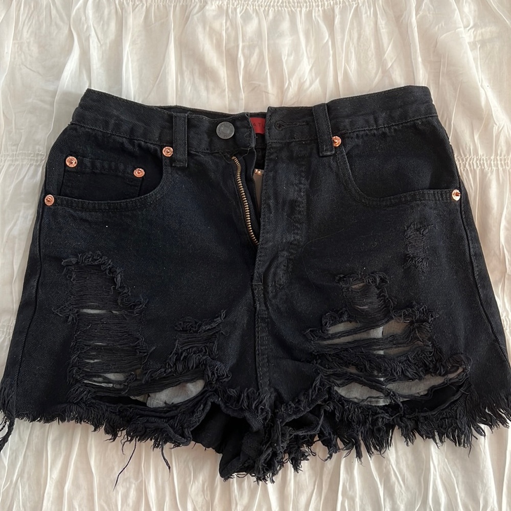 Distressed black denim shorts